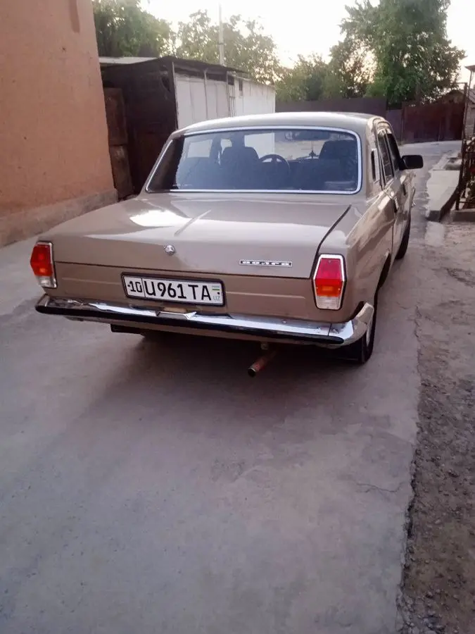 Автомобиль газ 2411